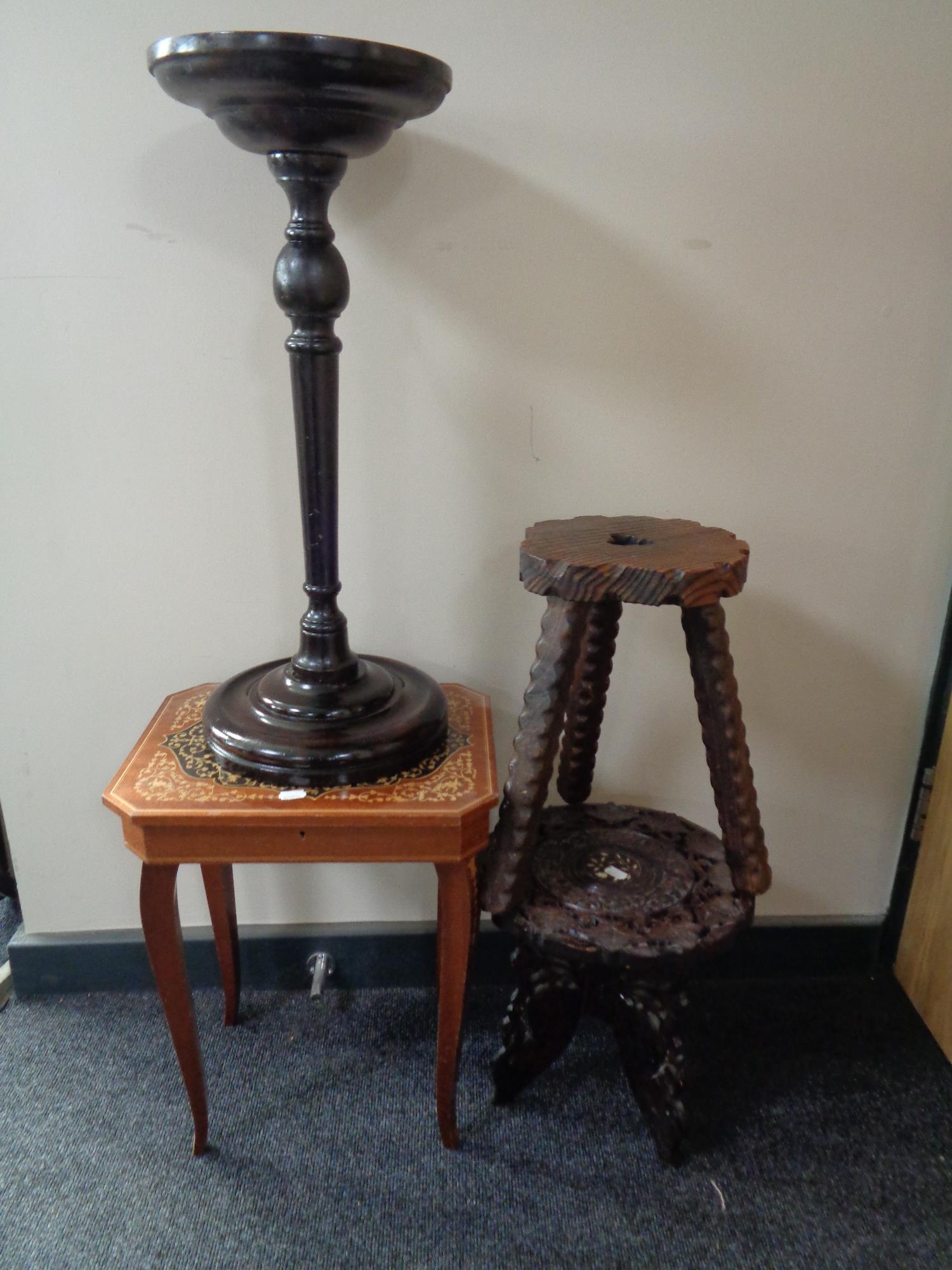 A music table together with a pine rustic stool and two plant stands