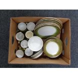 A box of Denby tea and dinner ware