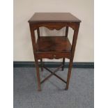 A Victorian occasional table fitted a drawer