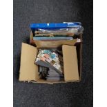 A box of stamp albums, world stamps,