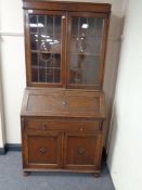 An Edwardian oak bureau bookcase 88 cm x 43 cm x 186 cm CONDITION REPORT: Some