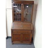 An Edwardian oak bureau bookcase 88 cm x 43 cm x 186 cm CONDITION REPORT: Some