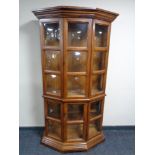 A colonial style display cabinet