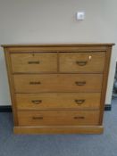 An Edwardian pine five drawer chest