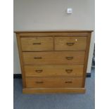 An Edwardian pine five drawer chest