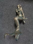 A metal figure - Mermaid