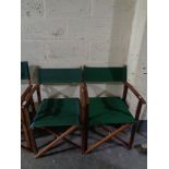 A pair of folding teak director's chairs