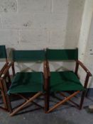 A pair of folding teak director's chairs