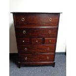 A Stag Minstrel seven drawer chest