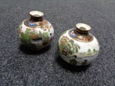 A pair of Noritake squat bulbous vases depicting Geisha, height 9 cm.