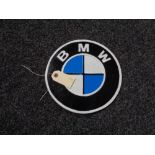 A metal BMW plaque