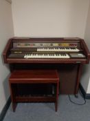 An electric GEM organ with stool