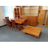 A Barker and Stonehouse dining room suite : four door sideboard,