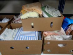 Four boxes of bedding, linen,