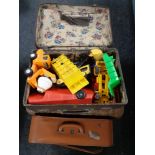 Two vintage luggage cases, toys,