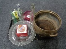 A tray of antique brass twin handled planter, assorted glass, boxed paperweight, glass bottles,