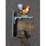 Two metal Welcome signs (one with bracket and bell)