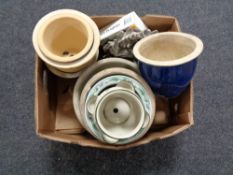 Two boxes of plant pots, wooden walking sticks,