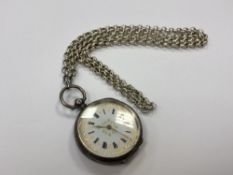 A continental silver fob watch with enamel dial,