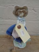 A Lladro figure - Girl with basket no.