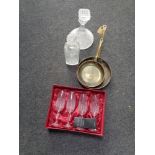 Two copper brass handled sauce pans together with two decanters and a set of four crystal champagne
