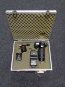 An aluminium camera case of Canon EOS 1000 F camera,