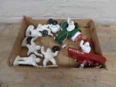 A box of six assorted Michelin man figures -tractor and bi-plane etc.