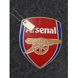A metal Arsenal plaque