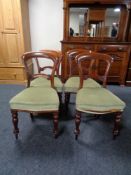 A set of four Victorian mahogany dining chairs