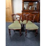 A set of four Victorian mahogany dining chairs