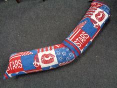 A stars and stripes bolster cushion