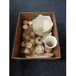 A box of Devon ware, china trinket sets, vases,