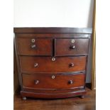 A Victorian mahogany four drawer miniature chest
