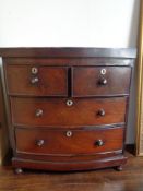 A Victorian mahogany four drawer miniature chest