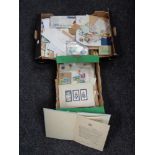 Two boxes of assorted loose stamps,