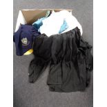 A box of antique and later clothing, two black robes, christening gowns,