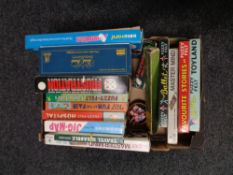 A box of twentieth century boardgames and toys,