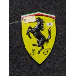 A metal Ferrari plaque