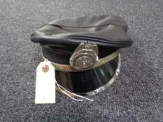 A Mr Hat leather cap bearing a constable badge