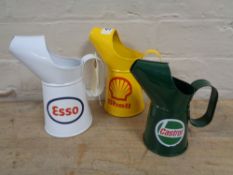 Three oil jugs - Esso,