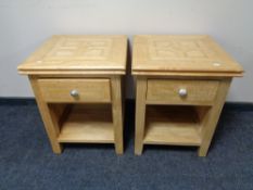 A pair of contemporary marble inlaid bedside tables