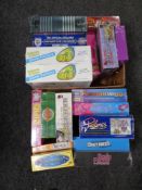 Two boxes of new sealed board games, who wants to be a millionaire, dvd quiz games,