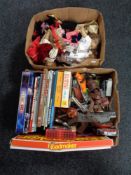 Two boxes of dolls, vintage annuals, toy guns,