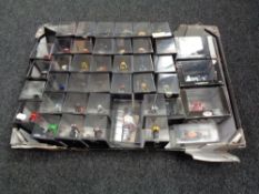 A box of die cast super bikes in display boxes