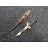 A twentieth century Swedish Mauser bayonet in leather sheath