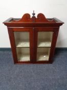 A Victorian mahogany double door wall cabinet