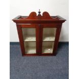 A Victorian mahogany double door wall cabinet