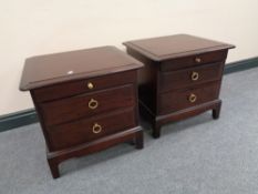 A pair of Stag Minstrel two drawer bedside tables