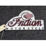 A metal Indian motorcycles plaque