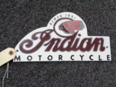 A metal Indian motorcycles plaque